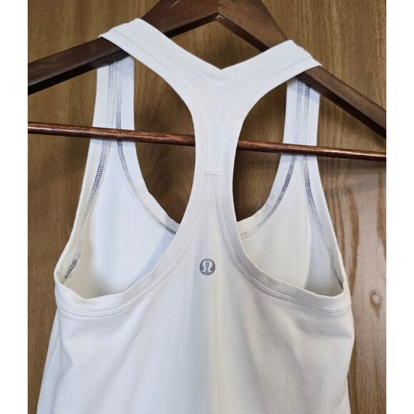 Lot Of 4 Lululemon One 28" Leggings, One Long Sleeve, Two Tank Tops - Picture 3 of 16